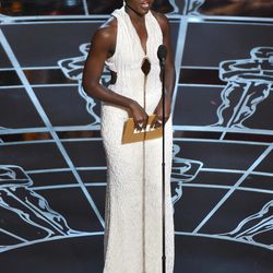 Lupita Nyong'o speaks at the Oscars on Sunday, Feb. 22, 2015, at the Dolby Theatre in Los Angeles. 