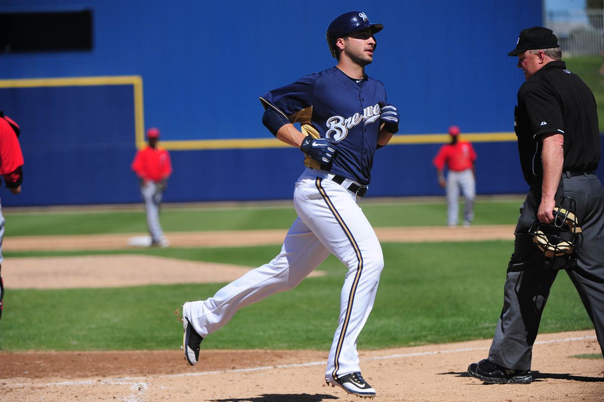 March 23, 2012; Phoenix, AZ, USA; Milwaukee Brewers left fielder Ryan Braun (8) scores during the fourth inning against the Los Angeles Angels at Maryvale Baseball Park. Mandatory Credit: Kyle Terada-US PRESSWIRE