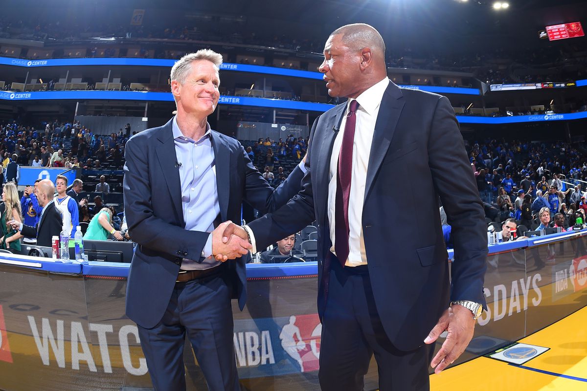Steve Kerr shaking hands with Doc Rivers
