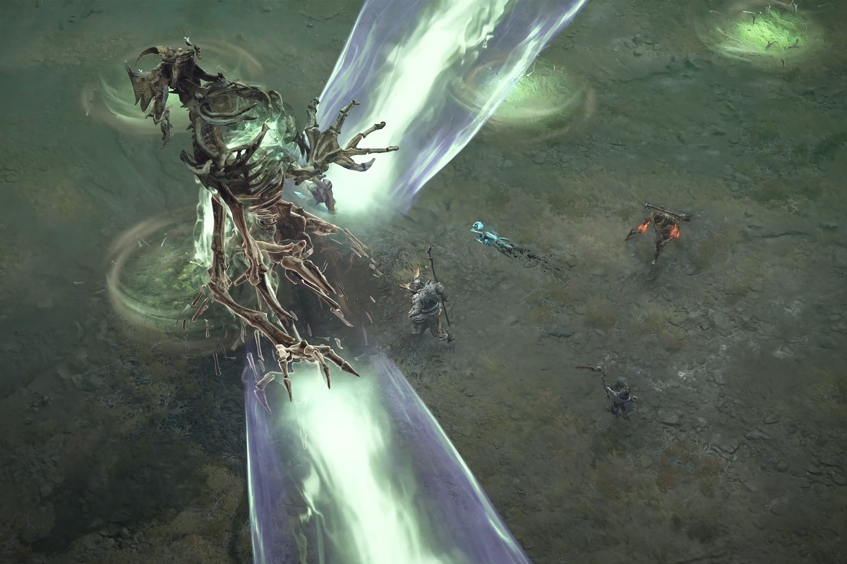 A group of players tackle a world boss in Diablo 4, who is a menacing giant skeleton with ethereal death energy roiling through its ribs.