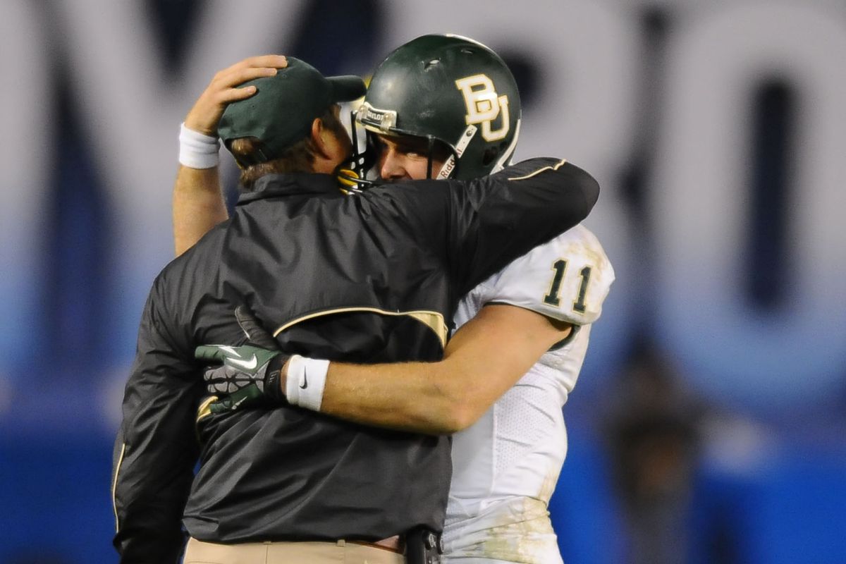Nick Florence and Art Briles embrace. The entire Holiday Bowl experience was like one giant love fest.