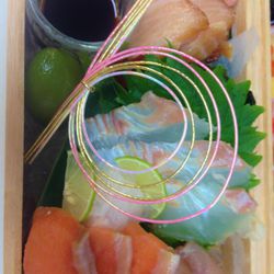 Assorted sashimi imported from Tsukiji Fish Market, Tokyo, including Chirashi sushi with Japanese King crab meat