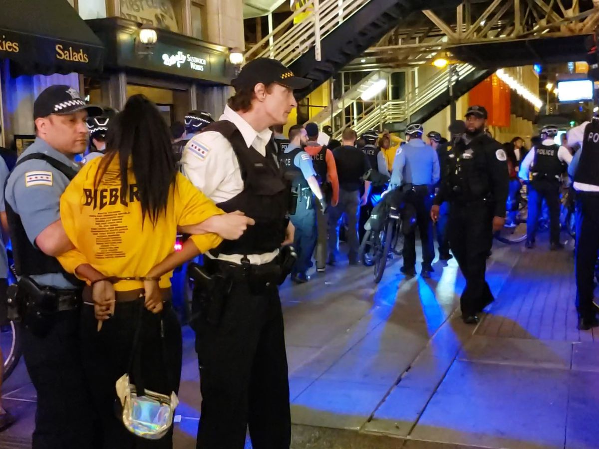 Chicago police arrested at least 30 people Wednesday evening as hundreds of teenagers converged on several areas throughout downtown causing mayhem, police said. | Nader Issa/Sun-Times