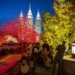 The Hansen family, of Salt Lake City, tour the Christmas lights near Temple Square in Salt Lake City on Friday, Nov. 25, 2016.