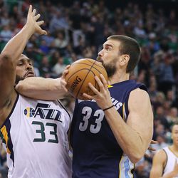 Memphis Grizzlies center Marc Gasol (33) is called for an offensive foul against Utah Jazz center Boris Diaw (33) during NBA basketball in Salt Lake City on Monday, Nov. 14, 2016.