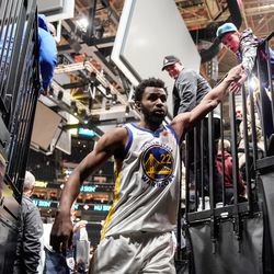 Golden State Warriors forward Andrew Wiggins exits the arena after winning an NBA game against Utah Jazz at Vivint Arena in Salt Lake City on Saturday, Jan. 1, 2022.