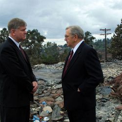 President Boyd K. Packer surveying the destruction of the San Diego-area wildfires with Bishop Michael J. Robertson of the Granite Hills Ward, El Cajon California Stake.  Photo by Jason Swenson (Submission date: 11/02/2003)