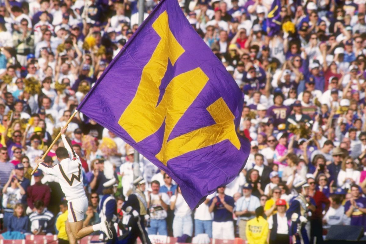 Jan 1, 1992:The Husky flag is run across the field in Pasadena prior to start of the Rose Bowl.