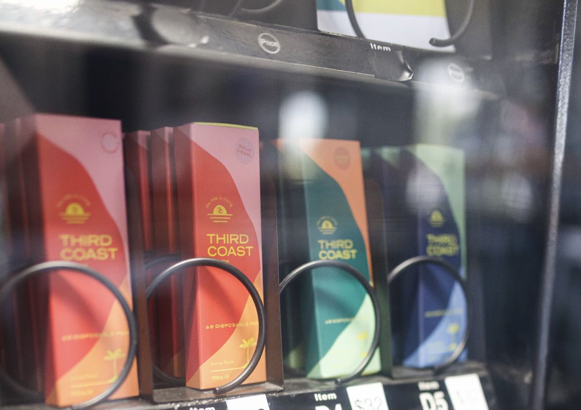 Third Coast packs of disposable vapes in a vending machine.