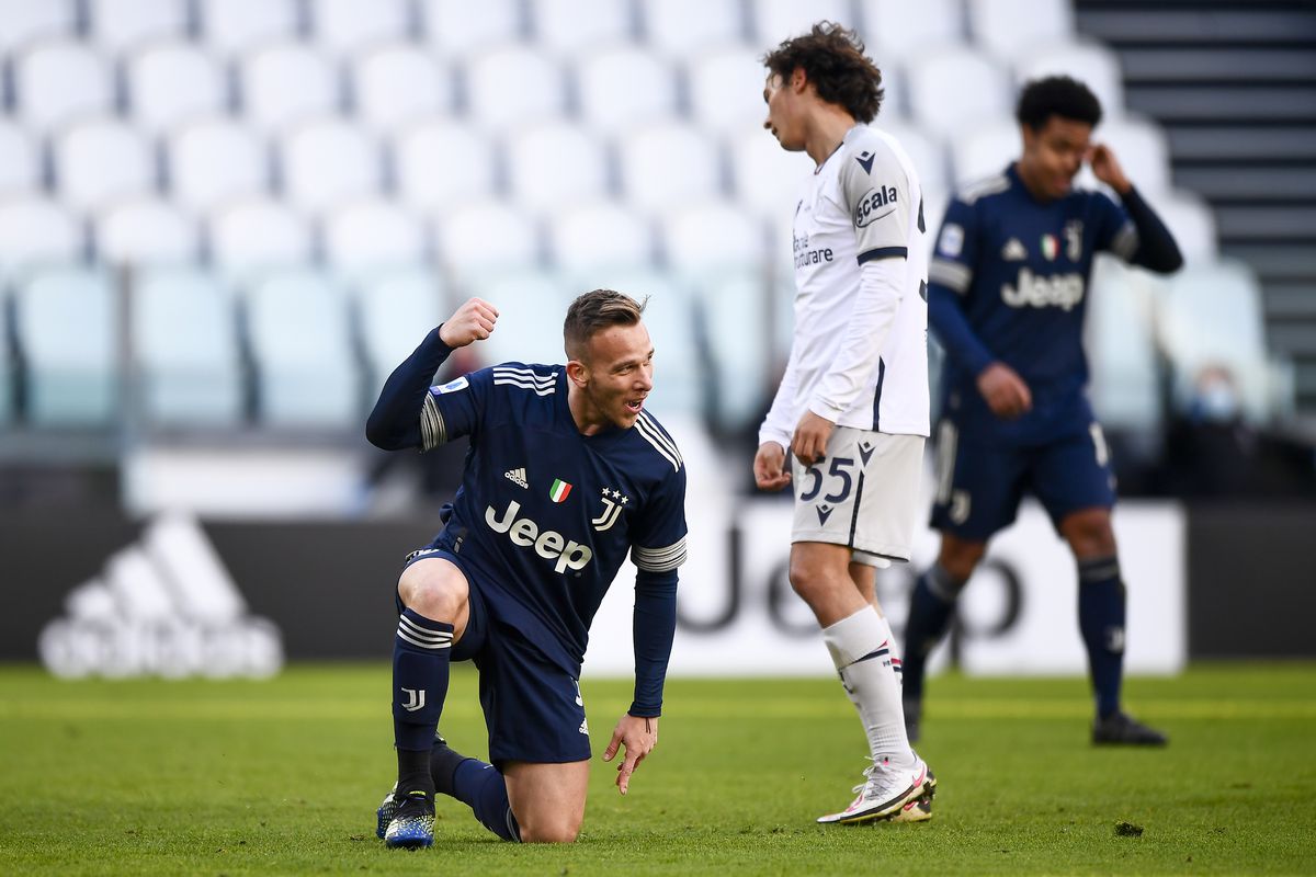 Arthur Melo (L) of Juventus FC celebrates after scoring the...