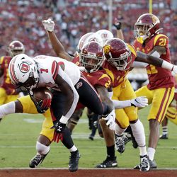 Utah running back Devonta’e Henry-Cole (7) runs in for a touchdown against Southern California during the first half of an NCAA college football game Friday, Sept. 20, 2019, in Los Angeles. 