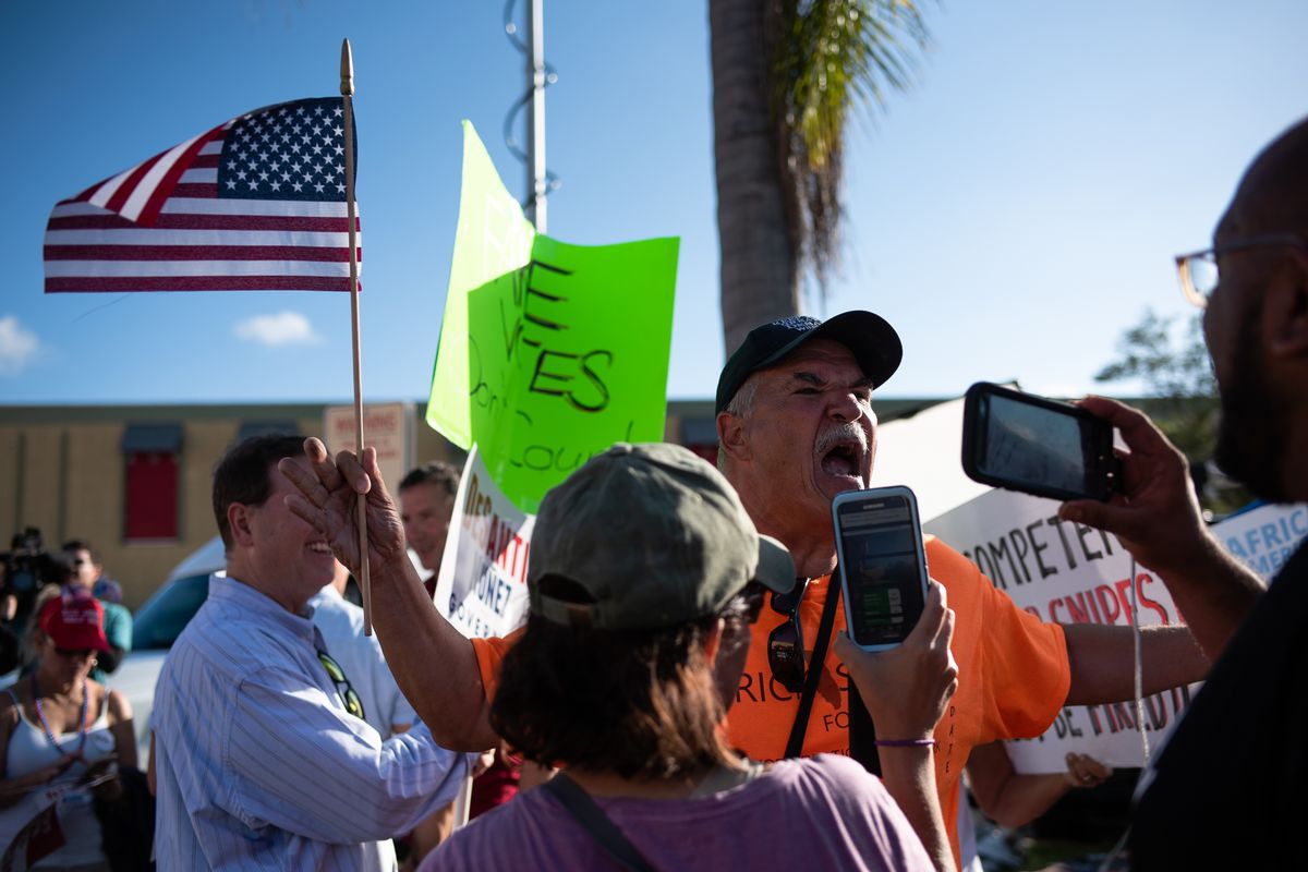 Protesters in support of Desantis and Gillum gather outside the Supervisor of Elections office in Broward County, Florida, where a recount is taking place for the Governor and Senator elections.