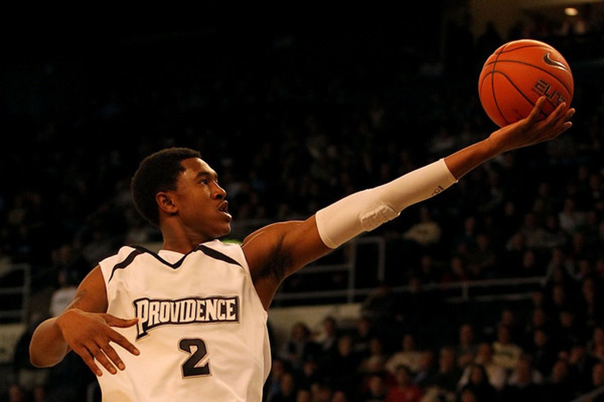 PROVIDENCE RI - DECEMBER 04:  Marshon Brooks #2 of the Providence Friars drives for a shot attempt against the Rhode Island Rams at the Dunkin' Donuts Center on December 4 2010 in Providence Rhode Island.  (Photo by Chris Chambers/Getty Images)