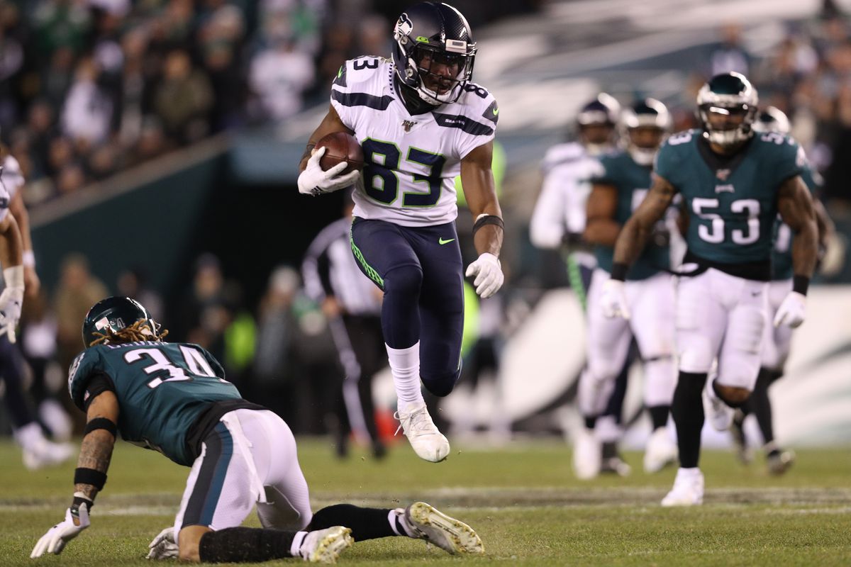 Wide receiver David Moore #83 of the Seattle Seahawks rushes past cornerback Cre’von LeBlanc #34 of the Philadelphia Eagles during their NFC Wild Card Playoff game at Lincoln Financial Field on January 05, 2020 in Philadelphia, Pennsylvania.