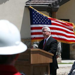 Bishop Dean M. Davies, Second Counselor in the Presiding Bishopric of The Church of Jesus Christ of Latter-day Saints, speaks during the groundbreaking ceremony for Sunrise Hall, a worship center at Camp Williams, Wednesday, June 5, 2013.