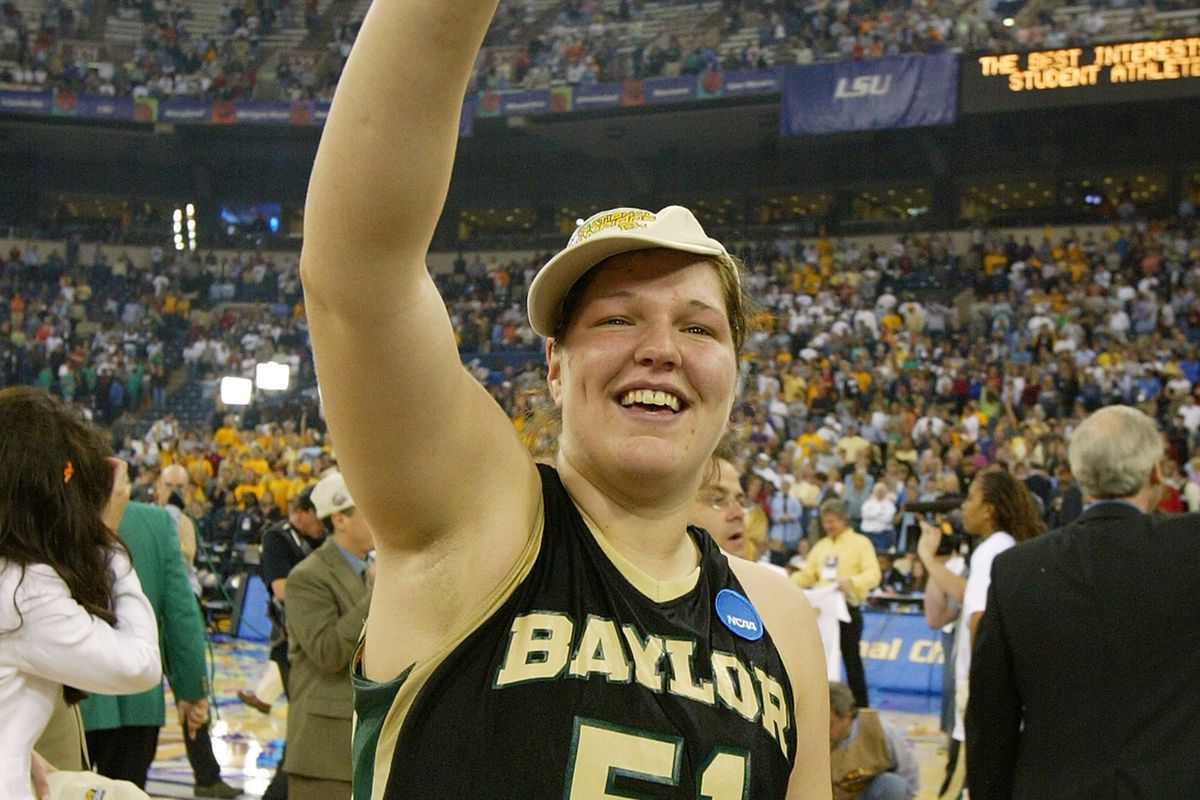 Emily Niemann #51 of the Baylor Lady Bears waves to the crowd after they defeated the Michigan State Spartans in the 2005 Women's NCAA Basketball National Championship game on April 5, 2005 at the RCA Dome in Indianapolis, Indiana.