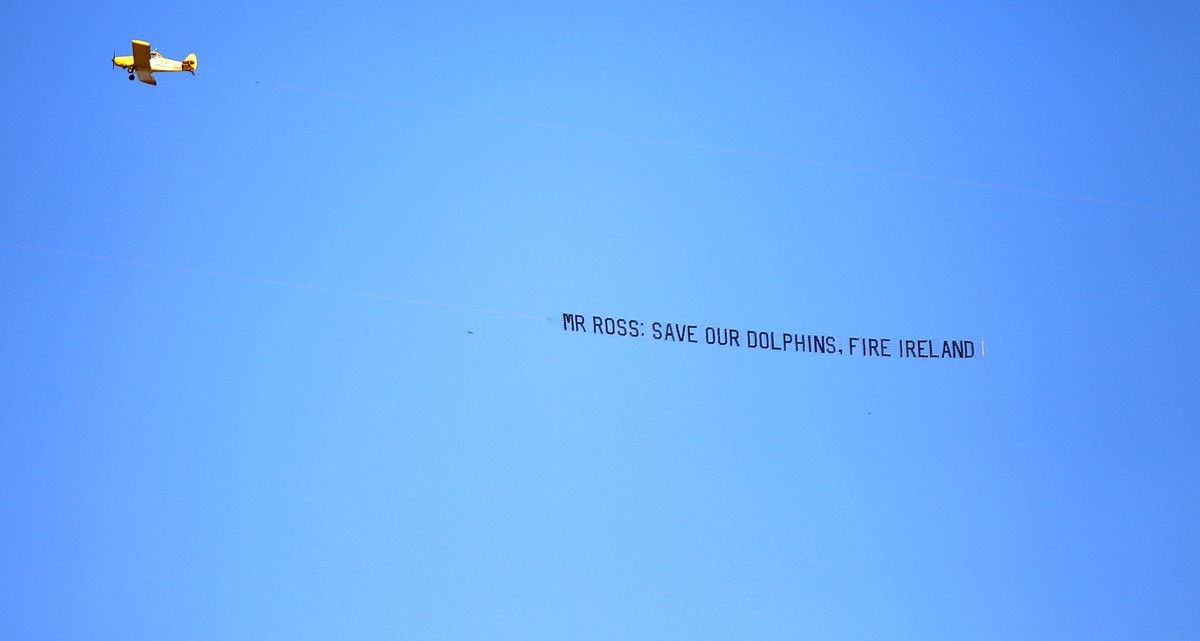 MIAMI GARDENS, FL:  A banner plan delivers a message to Miami Dolphins owner Stephen Ross and general manager Jeff Ireland prior to a game at Sun Life Stadium.