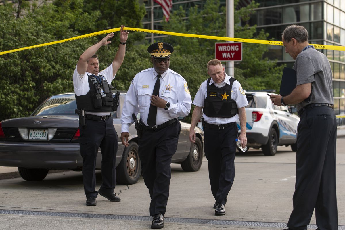 Chicago Police Supt. David Brown, center, walks over to reporters at the scene where a 31-year-old woman was fatally stabbed Saturday afternoon in the 400 block of South Wacker Drive in The Loop neighborhood. 