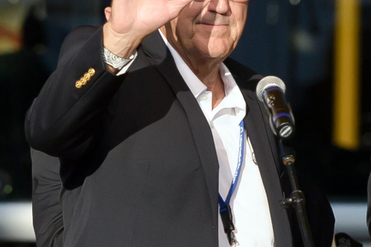 Jul. 20, 2012; South Bend, IN, USA; Michigan former coach Lloyd Carr waves after receiving his blazer at the Hall of Fame blazer presentation at the College Football Hall of Fame. Mandatory Credit: Matt Cashore-US PRESSWIRE