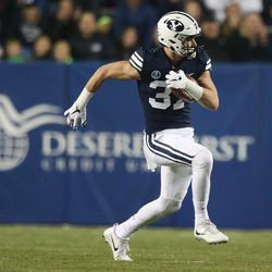 Brigham Young Cougars Grant Jones returns an interception against Boise in Provo on Friday, Oct. 6, 2017.