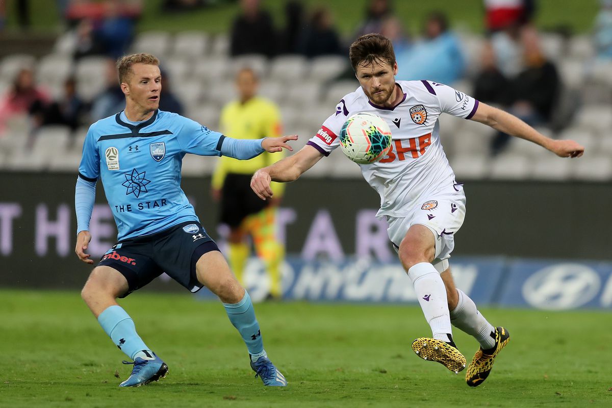 Alexander Grant of Perth Glory and Trent Buhagiar of Sydney FC during the round 23 A-League match between Sydney FC and the Perth Glory at Netstrata Jubilee Stadium on March 14, 2020 in Sydney, Australia.