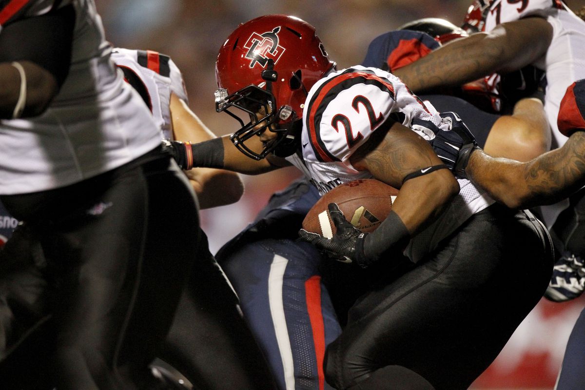 Oct 3, 2014; Fresno, CA, USA; San Diego State Aztecs running back Chase Price (22) runs the ball against the Fresno State Bulldogs in the second quarter at Bulldog Stadium. Mandatory Credit: Cary Edmondson-USA TODAY Sports