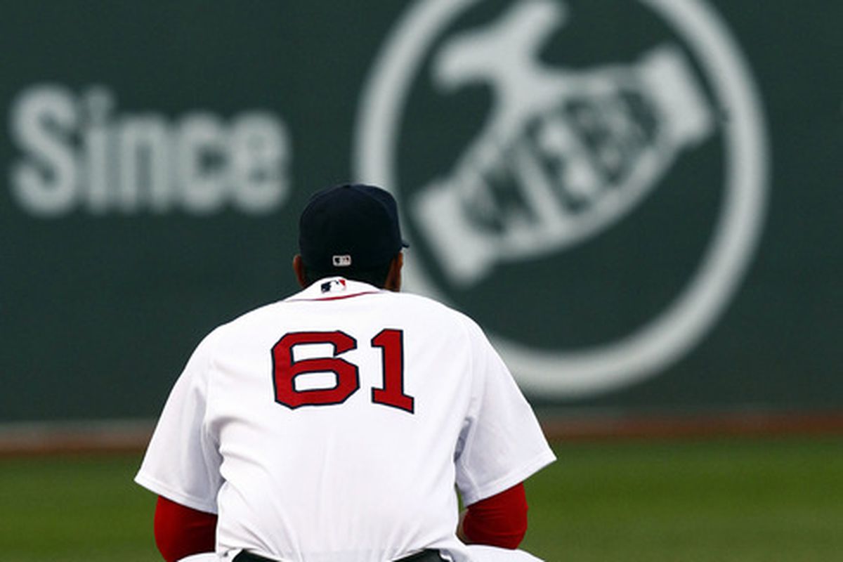 Jun 25, 2012; Boston, MA, USA; Boston Red Sox starting pitcher Felix Doubront (61) reacts after giving up a home run against the Toronto Blue Jays  during the first inning at Fenway Park.  Mandatory Credit: Mark L. Baer-US PRESSWIRE