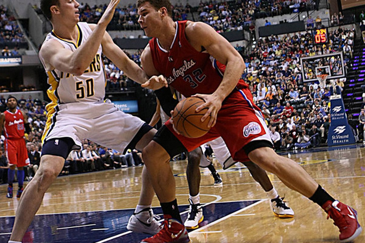 Mar 20, 2012; Indianapolis, IN, USA; Los Angeles Clippers forward Blake Girffin (32) drives to the basket against Indiana Pacers forward Tyler Hansbrough (50) at Bankers Life Fieldhouse.  Mandatory Credit: Brian Spurlock-US PRESSWIRE