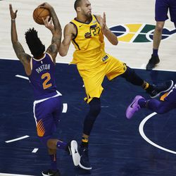 Utah Jazz center Rudy Gobert (27) has the ball stolen by Phoenix Suns guard Elfrid Payton (2) in Salt Lake City on Thursday, March 15, 2018.