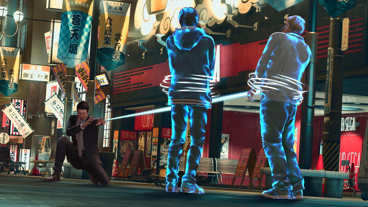 Kazuma Kiryu fires a binding wire at two thugs on the streets of Sotenbori in a screenshot from Like a Dragon Gaiden: The Man Who Erased His Name 