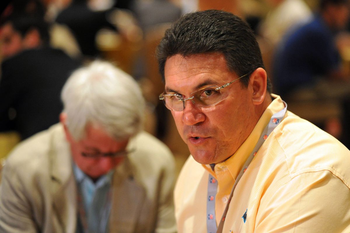 March 28,  2012; Palm Beach, FL, USA; Carolina Panthers head coach Ron Rivera (right) fields questions from reporters during the NFC head coaches media breakfast at the Breakers Hotel. Mandatory Credit: Steve Mitchell-US PRESSWIRE