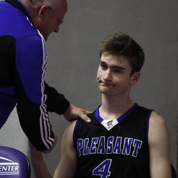 Pleasant Grove's Riley Court (4) looks glum as Davis plays Pleasant Grove in the 5A boys basketball quarterfinals at the Dee Events Center in Ogden Wednesday, Feb. 25, 2015.