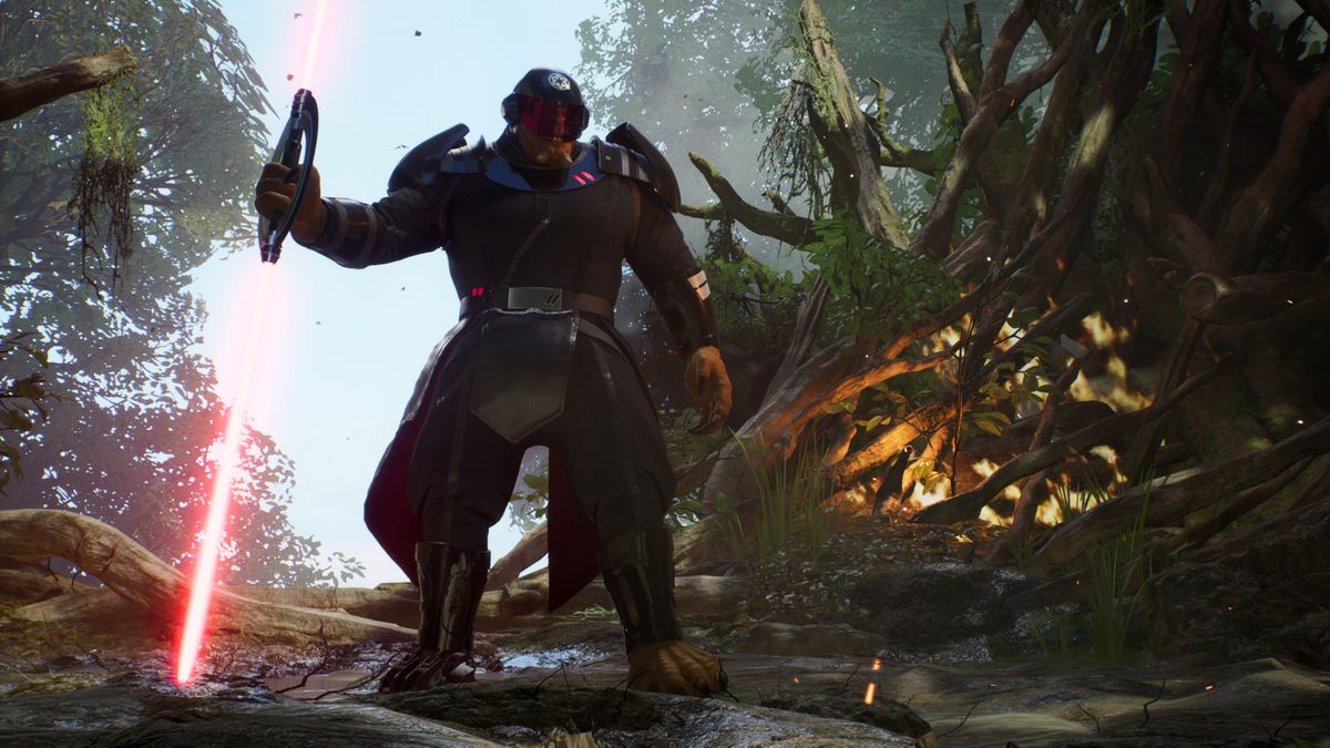 a large alien enemy stands holding a double-bladed red lightsaber in a screenshot from Star Wars Jedi: Fallen Order