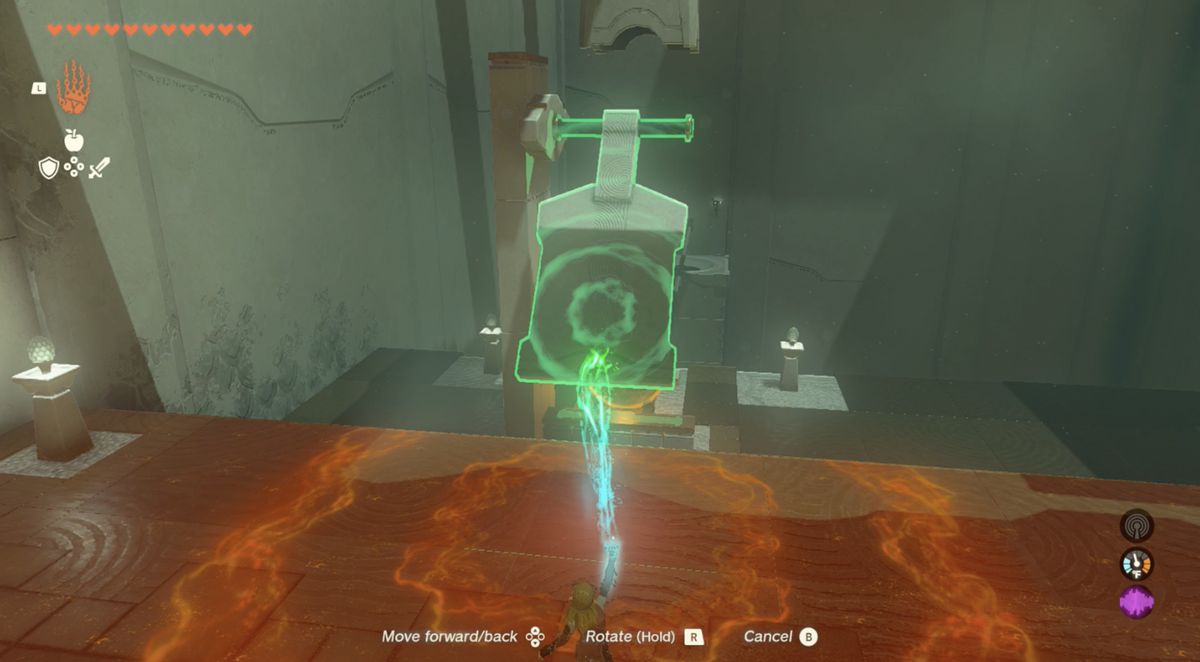 Link lifts up a stone slapper in the Utsushok Shrine in Zelda: Tears of the Kingdom
