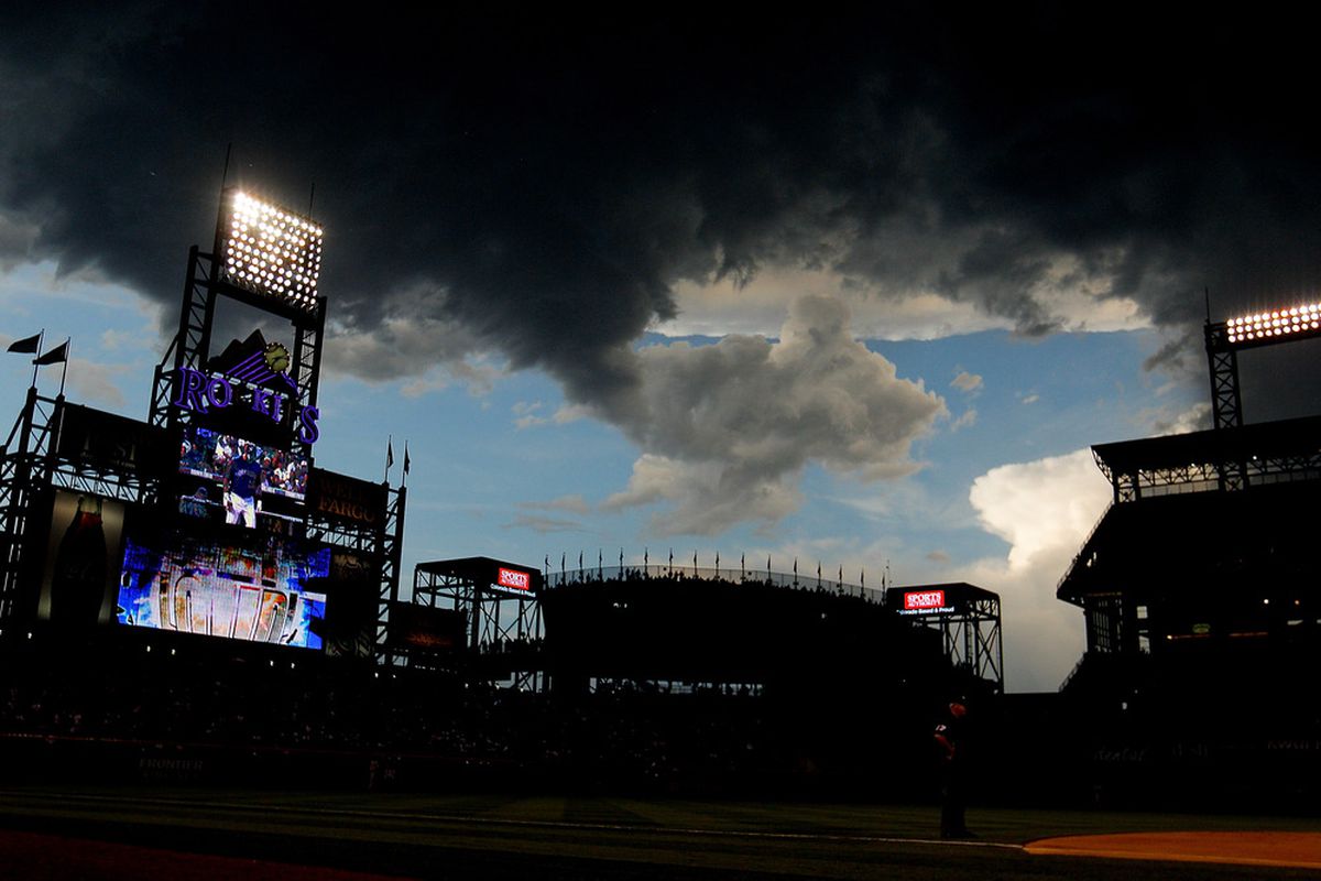 DENVER, CO - JUNE 13:  A thunder storm moves over the stadium during the sixth inning in a game between the San Diego Padres and Colorado Rockies at Coors Field on June 13, 2011 in Denver, Colorado. (Photo by Justin Edmonds/Getty Images)