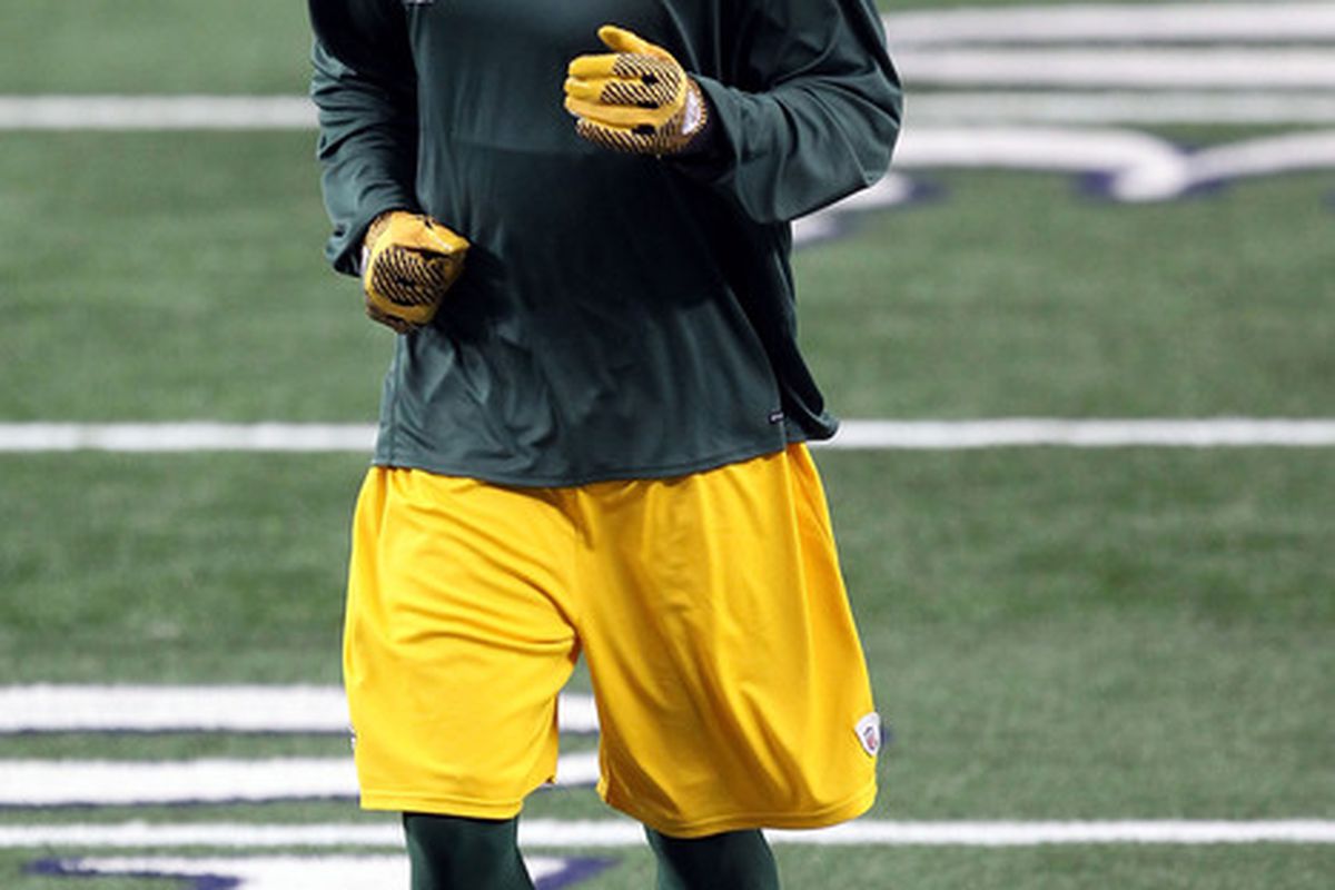 ARLINGTON TX - FEBRUARY 06: James Jones #89 of the Green Bay Packers warms up before Super Bowl XLV at Cowboys Stadium on February 6 2011 in Arlington Texas.  (Photo by Mike Ehrmann/Getty Images)