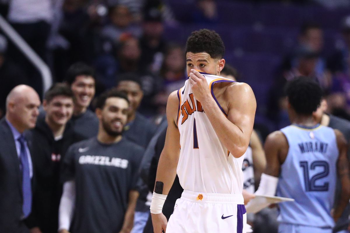 Phoenix Suns guard Devin Booker reacts against the Memphis Grizzlies in the second half at Talking Stick Resort Arena.