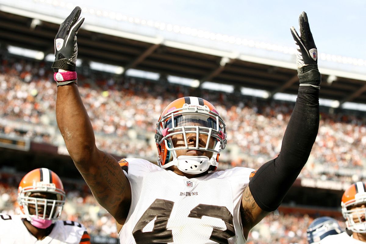 CLEVELAND, OH - OCTOBER 23:  Defensive back T.J. Ward #43 of the Cleveland Browns celebrates after an interception against the Seattle Seahawks at Cleveland Browns Stadium on October 23, 2011 in Cleveland, Ohio.  (Photo by Matt Sullivan/Getty Images)