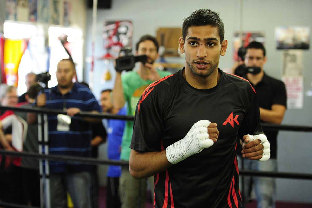 Amir Khan will be back on December 15, according to Richard Schaefer. (Photo by Robert Laberge/Getty Images)
