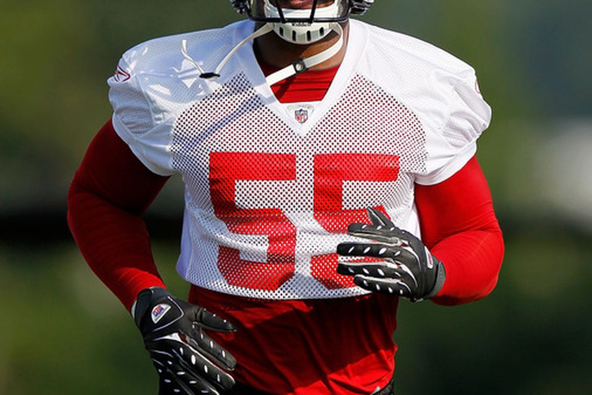 FLOWERY BRANCH GA - JULY 30:  John Abraham #55 of the Atlanta Falcons runs drills during opening day of training camp on July 30 2010 at the Falcons Training Complex in Flowery Branch Georgia.  (Photo by Kevin C. Cox/Getty Images)