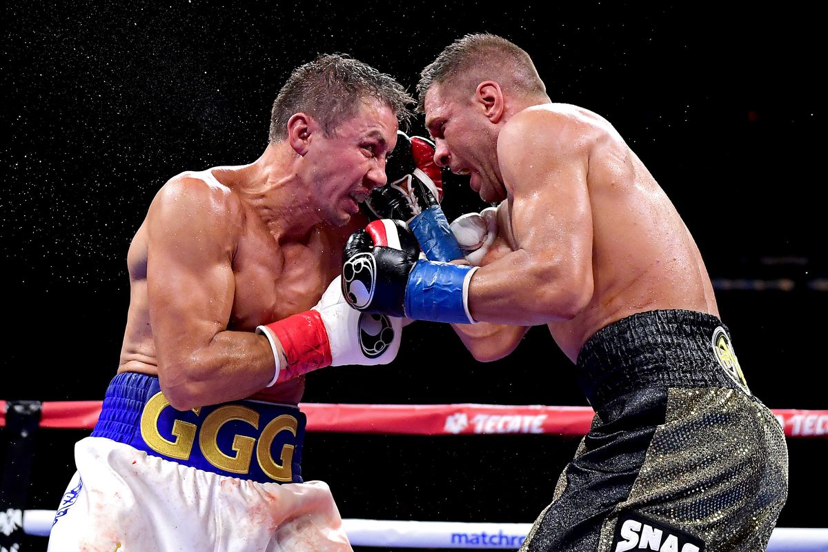 Gennady Golovkin (L) exchanges punches with Sergiy Derevyanchenko during their IBF middleweight title bout at Madison Square Garden on October 05, 2019 in New York City.