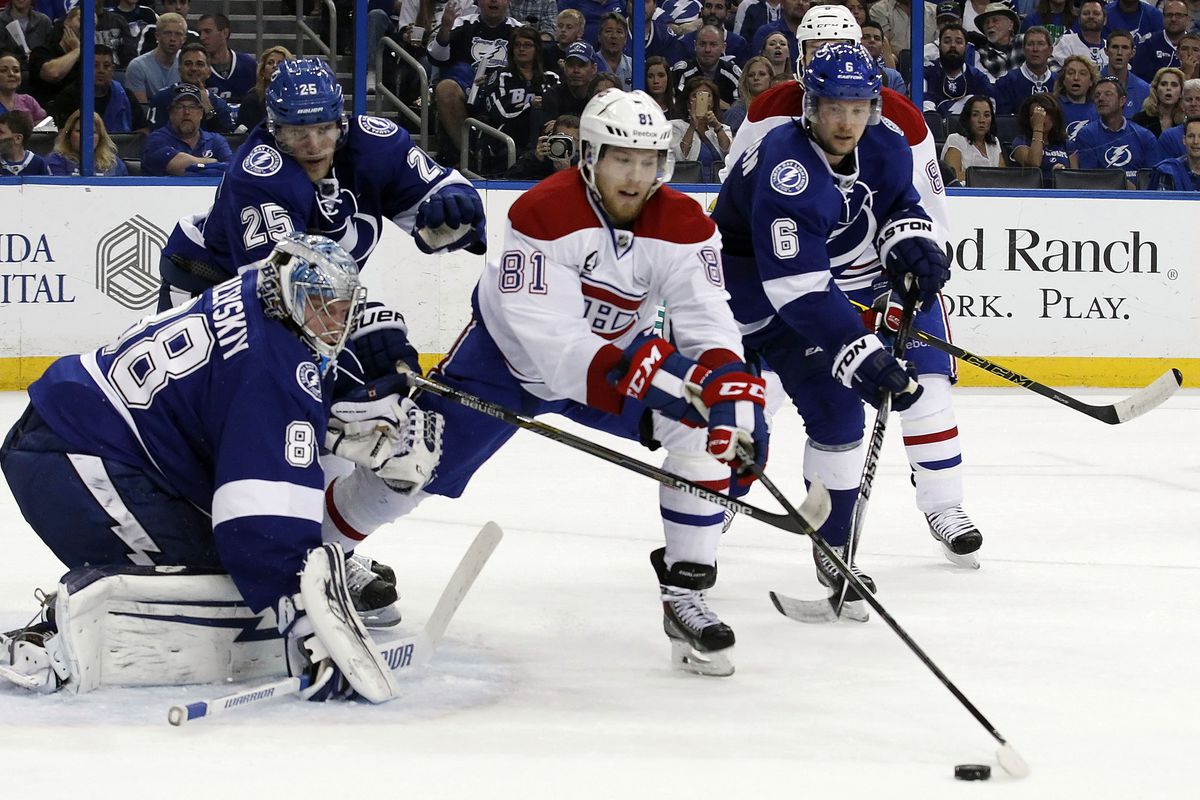 Montreal Canadiens center Lars Eller (81) shoots as Tampa Bay Lightning goalie Andrei Vasilevskiy (88) defends during the second period in Game Four of the second round of the 2015 Stanley Cup Playoffs at Amalie Arena.