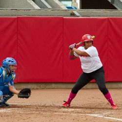 A University of Utah batter stands in at the plate of a softball game.