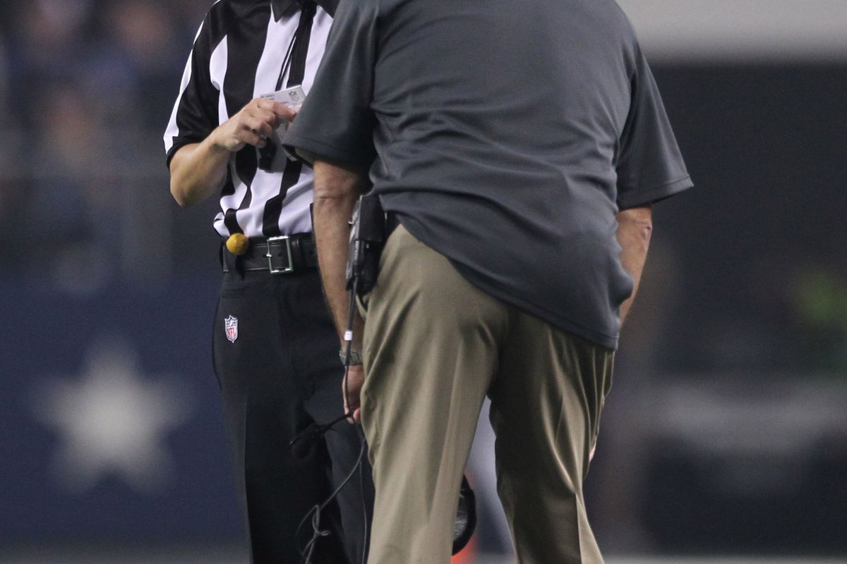 Aug 25, 2012; Arlington, TX, USA; Line judge Shannon Eastin talks with St Louis Rams head coach Jeff Fisher during the second half against the Dallas Cowboys at Cowboys Stadium. Mandatory Credit: Matthew Emmons-US PRESSWIRE