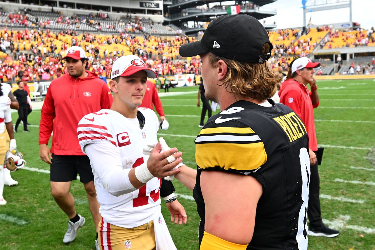 Kenny Pickett #8 of the Pittsburgh Steelers talks with Brock Purdy #13 of the San Francisco 49ers after the 49ers defeated the Steelers, 30-7, at Acrisure Stadium on September 10, 2023 in Pittsburgh, Pennsylvania.