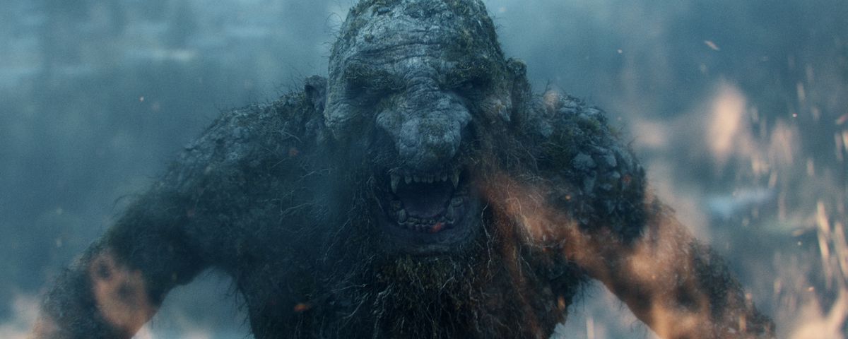 A facial close-up of the rocky, bulbous-nosed, 50-meter-tall troll in Troll, roaring at the screen