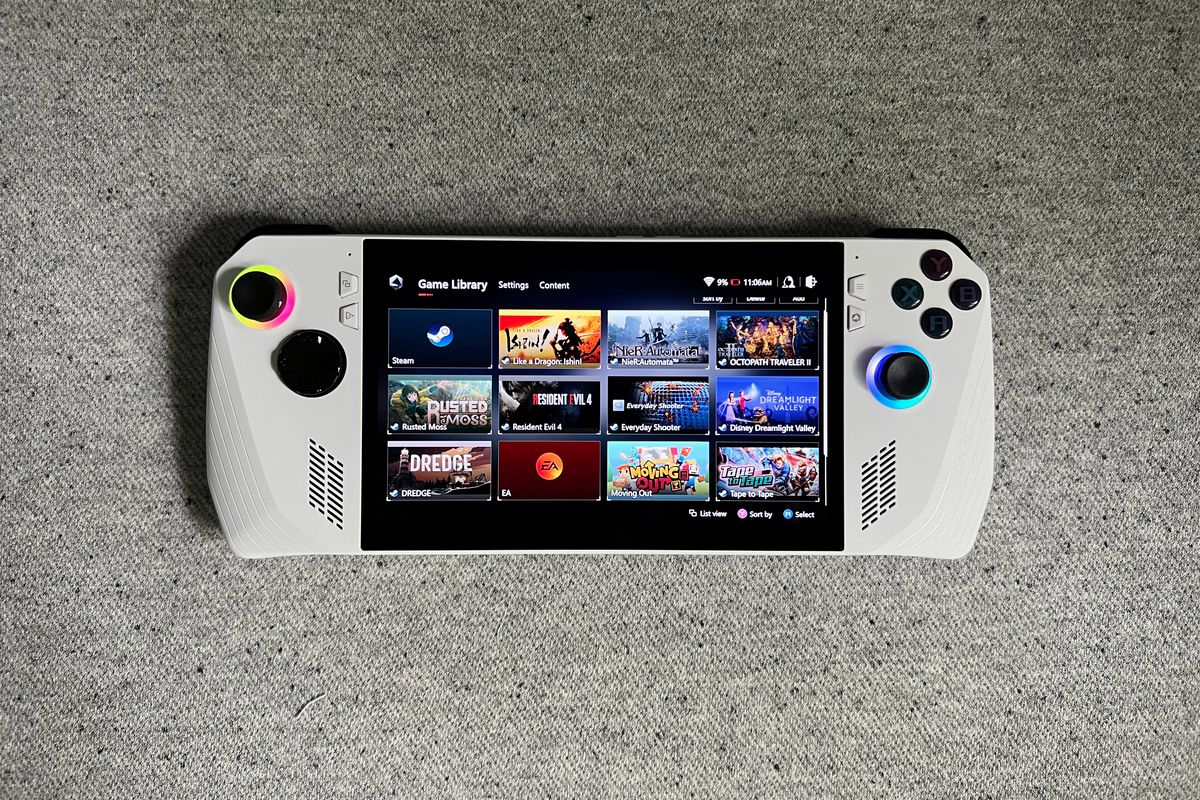 the game library screen of the Asus ROG Ally gaming handheld, lying on gray fabric, photographed from above
