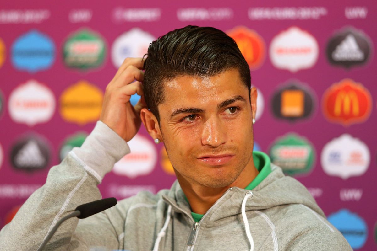 L'VIV, UKRAINE - JUNE 08:  In this handout image provided by UEFA, Cristiano Ronaldo of Portugal talks to the media during a UEFA EURO 2012 press conference at the Arena Lviv on June 8, 2012 in Lviv, Ukraine.  (Photo by Handout/UEFA via Getty Images)