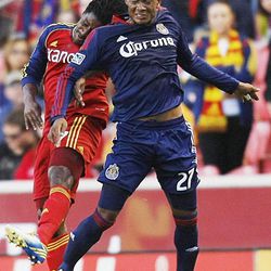 Real's Lovel Palmer battles to head the ball against Jose Correa as Real Salt Lake and Chivas USA play Saturday, April 20, 2013 at Rio Tinto Stadium.