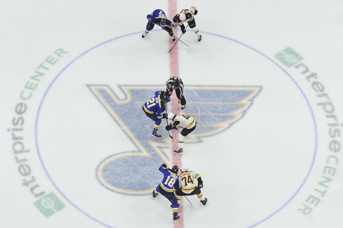 Jun 9, 2019; St. Louis, MO, USA; St. Louis Blues center Tyler Bozak (21) and Boston Bruins center David Krejci (46) take a face off in the third period in game six of the 2019 Stanley Cup Final at Enterprise Center. Mandatory Credit: Jeff Curry  